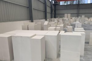 What do the three letters of fused cast AZS  bricks mean?